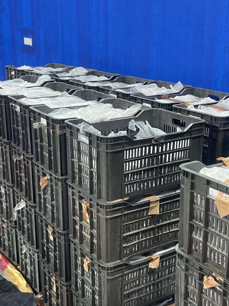 Lined crate staging of bulk packs before load-out
