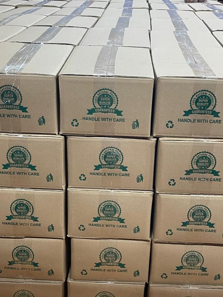 Natural-product export cartons stacked for shipment